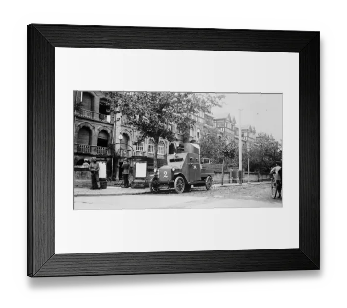 Framed Print : The situation in China. A British armoured car on duty in a street at Shanghai