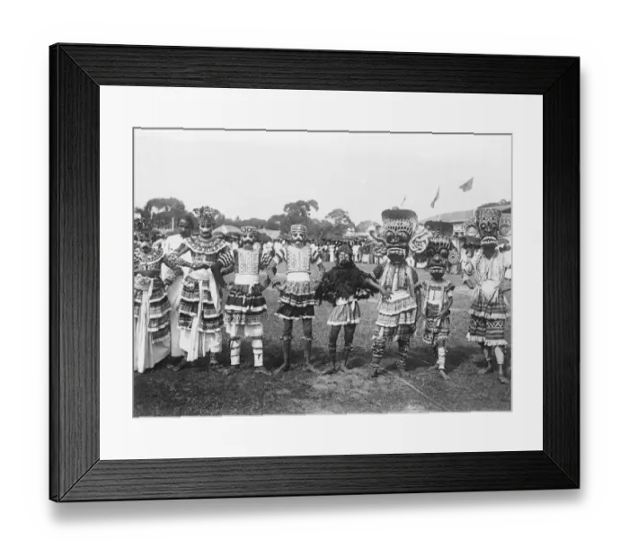 Framed Print : Devil dancers race for charity. An amusing picture from Colombo, where a number Framed Print : Devil dancers race for charity. An amusing picture from Colombo, where a number