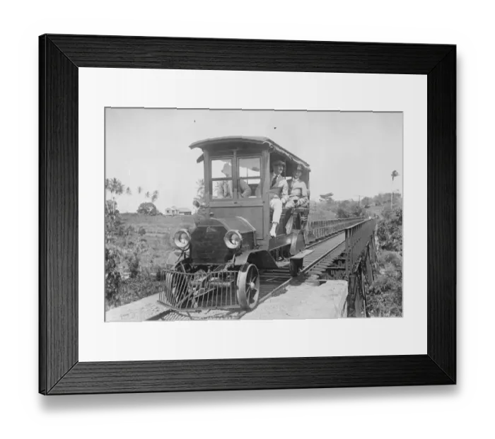 Framed Print : Where motor cars run on rails. An interesting picture from Porto Rico, showing a Cadillac car Framed Print : Where motor cars run on rails. An interesting picture from Porto Rico, showing a Cadillac car