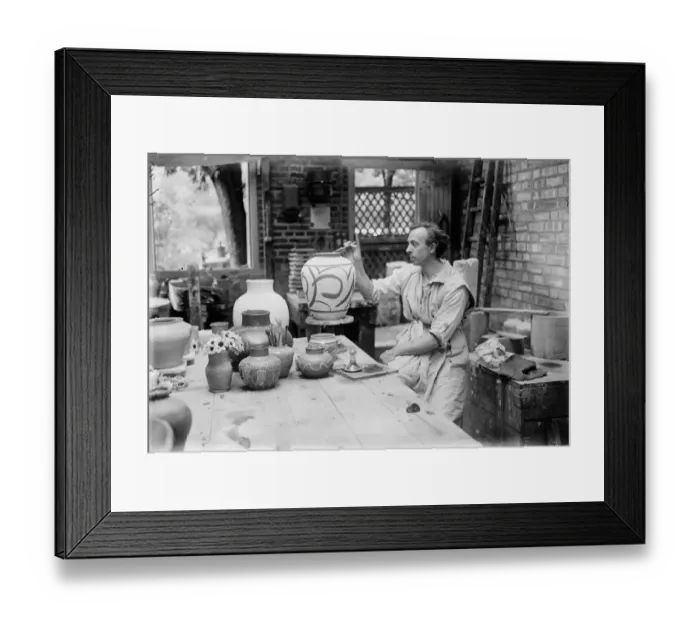 Framed Print : Distinguished artist potter who has his studio and kiln in London garden. Beautiful