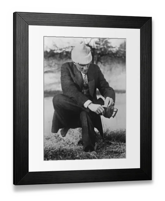 Framed Print : Henry Ford on a skating holiday. Henry Ford, the motor car king, putting on his Framed Print : Henry Ford on a skating holiday. Henry Ford, the motor car king, putting on his