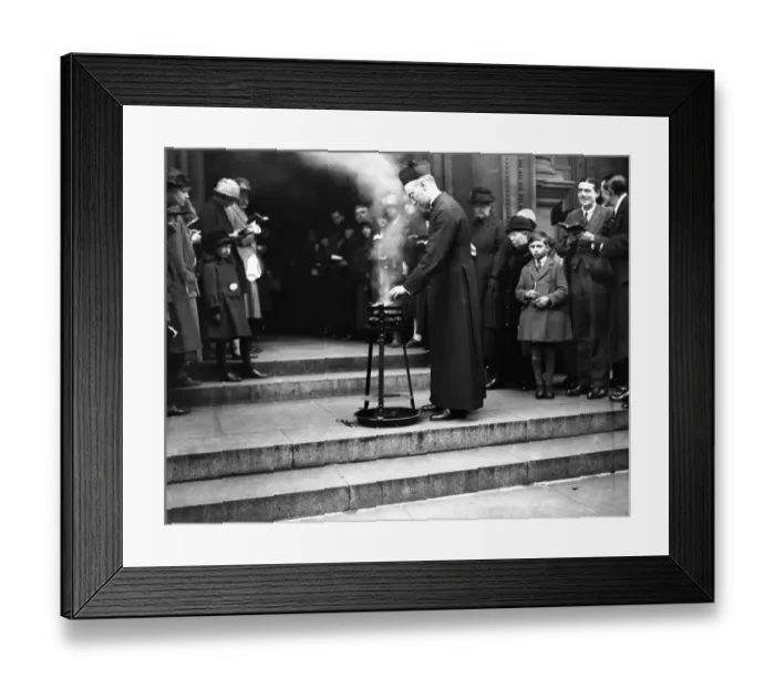 Framed Print : An Easter custom at Westminster Cathedral. Lighting the holy fire. 10 April 1925 Framed Print : An Easter custom at Westminster Cathedral. Lighting the holy fire. 10 April 1925