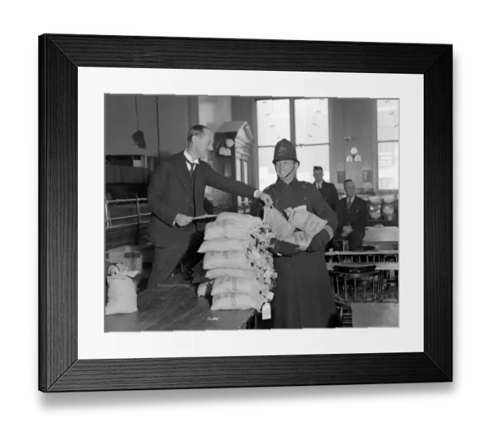 Framed Print : Christmas share-out. £67, 000 was the sum involved in this years annual share out Framed Print : Christmas share-out. £67, 000 was the sum involved in this years annual share out
