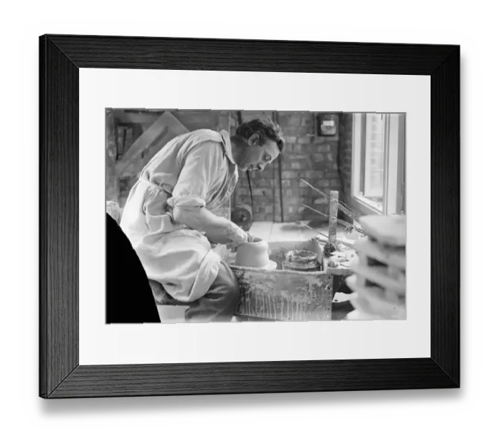 Framed Print : Distinguished artist potter who has his studio and kiln in London garden. Beautiful