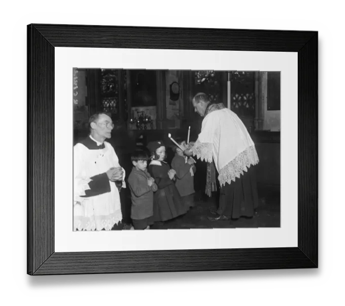Framed Print : The Blessing of the Throats of the congregation at St Etheldredas Church Framed Print : The Blessing of the Throats of the congregation at St Etheldredas Church