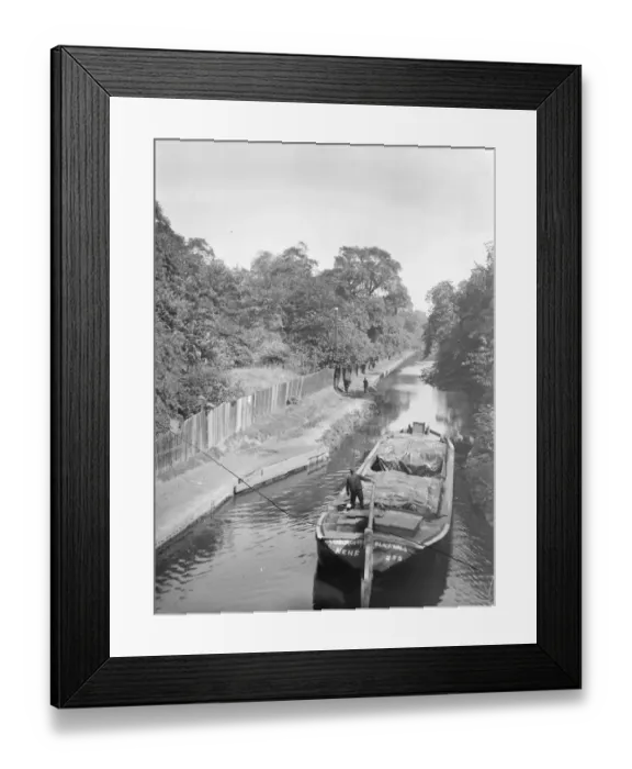 Framed Print : A canal barge on the Southern Blackwall Canal from the Vokins Company Ltd. undated Framed Print : A canal barge on the Southern Blackwall Canal from the Vokins Company Ltd. undated