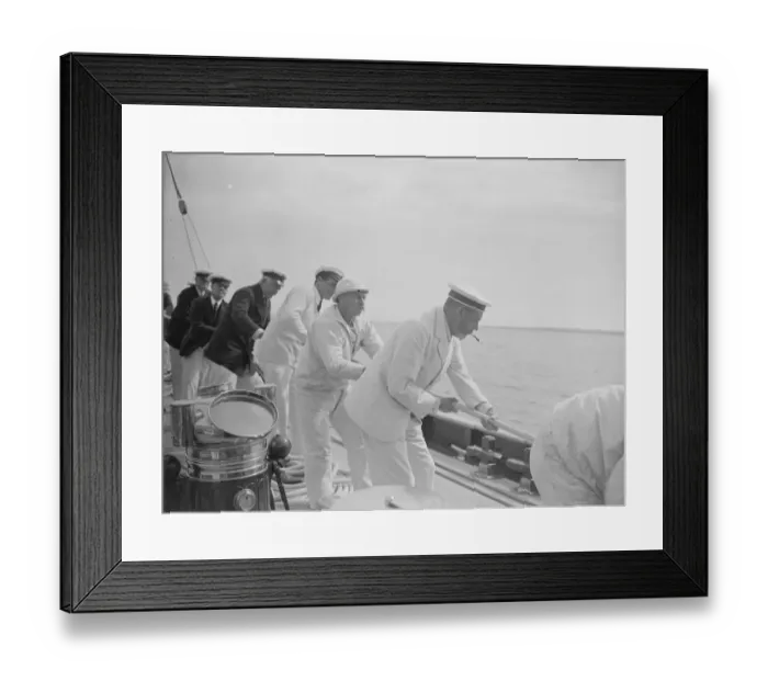 Framed Print : The King takes the wheel of his yacht Britannia. The King assists in hauling the spinnaker Framed Print : The King takes the wheel of his yacht Britannia. The King assists in hauling the spinnaker