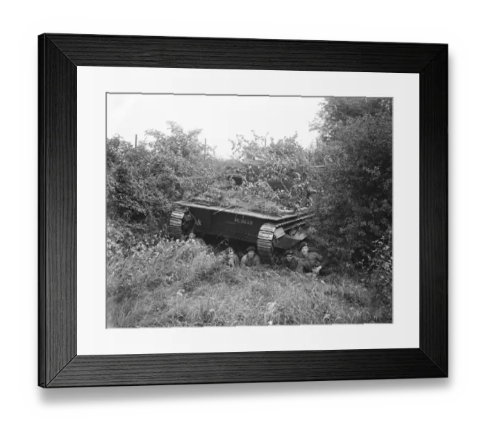 Framed Print : A tank crew resting under a camouflaged tank. At the manoeuvres at Oxford. 5 September