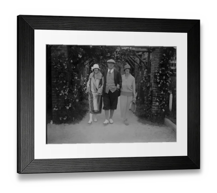 Framed Print : A celebrity at Le Touquet. Mr P G Wodehouse, the well known author, photographed with his wife Framed Print : A celebrity at Le Touquet. Mr P G Wodehouse, the well known author, photographed with his wife