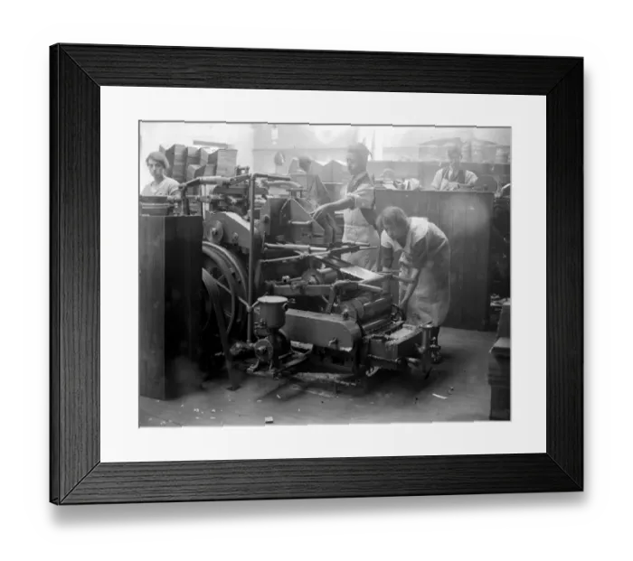 Framed Print : At Messrs James Burns Book Binding works at Esher. The Sheridan case making machine
