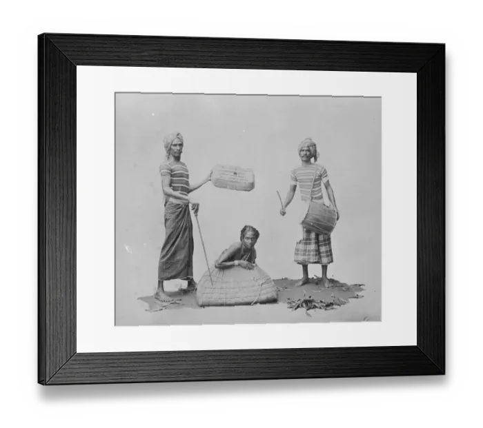 Framed Print : Indian types. An Indian juggler performing the famous basket trick. 1925