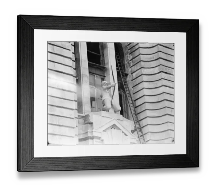 Framed Print : Mysterious Statuary on Londons New County Ball The figure of an archer who gazes Framed Print : Mysterious Statuary on Londons New County Ball The figure of an archer who gazes