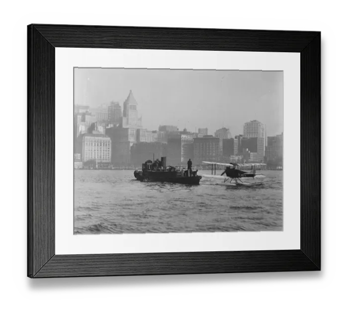 Framed Print : Sir Alan and Lady Cobham visit America. Sir Cobhams machine being towed Framed Print : Sir Alan and Lady Cobham visit America. Sir Cobhams machine being towed