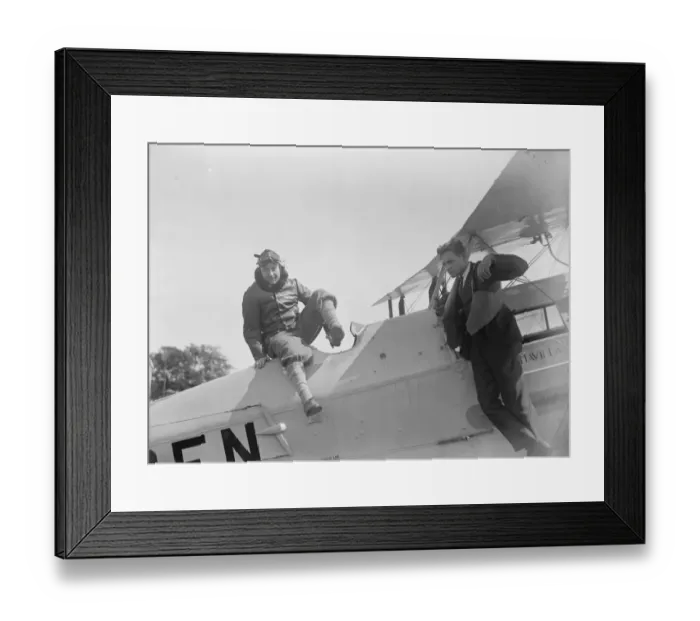 Framed Print : Cobham wins great air race Cobham and his mechanic leaping from their machine immediately Framed Print : Cobham wins great air race Cobham and his mechanic leaping from their machine immediately