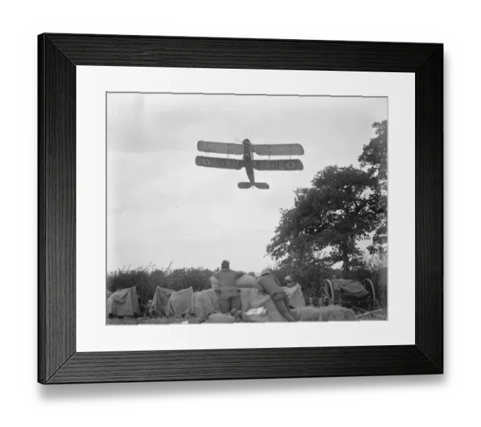 Framed Print : Aeroplanes launch flour bag bombs on troops in great battle of Hogs Back Divisional