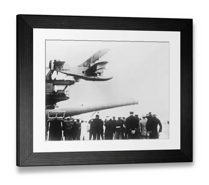 Framed Print : Amphibian plane fired from turret of a battleship for the first time. The first Framed Print : Amphibian plane fired from turret of a battleship for the first time. The first