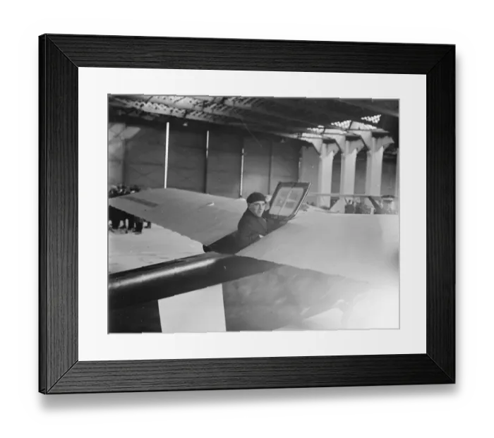 Framed Print : Lympne light aeroplane trials Mr M W Piercey about to close the wing after taking Framed Print : Lympne light aeroplane trials Mr M W Piercey about to close the wing after taking