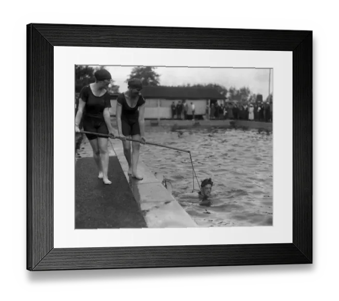 Framed Print : Learning to swim at Tonbridge open - air swimming pool. 23 June 1920 Framed Print : Learning to swim at Tonbridge open - air swimming pool. 23 June 1920
