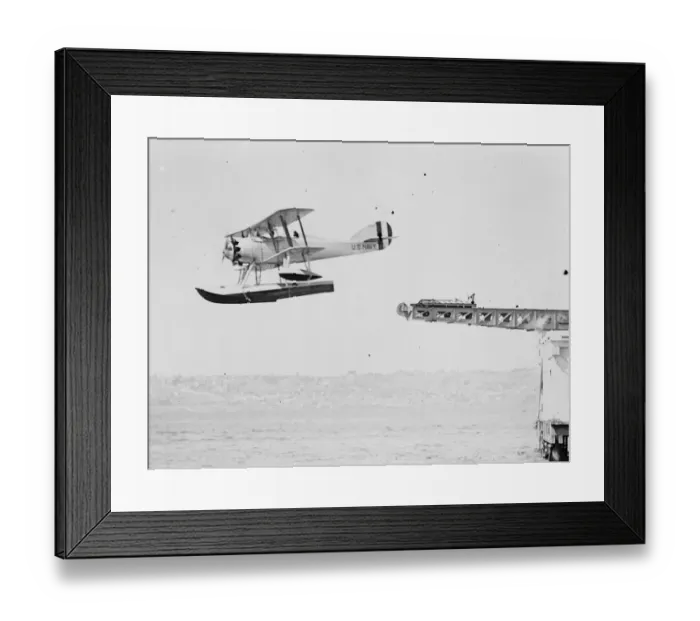 Framed Print : A novel catapult. An American scout Curtiss XF7C-1 Seahawk plane being launched Framed Print : A novel catapult. An American scout Curtiss XF7C-1 Seahawk plane being launched