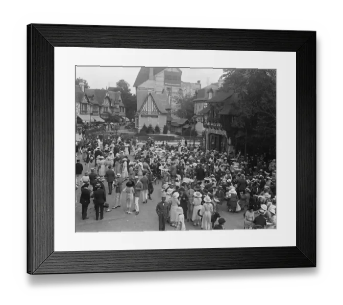 Framed Print : The Deauville season. A general view of the crowd outside one of the open air cafes at Deauville Framed Print : The Deauville season. A general view of the crowd outside one of the open air cafes at Deauville