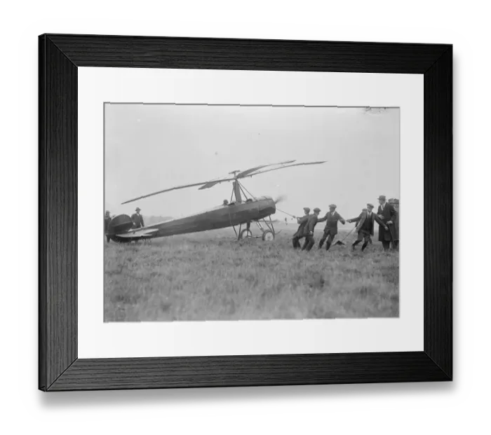 Framed Print : The autogiro demonstrated at Farnborough. Starting the machine. 19 October 1925 Framed Print : The autogiro demonstrated at Farnborough. Starting the machine. 19 October 1925