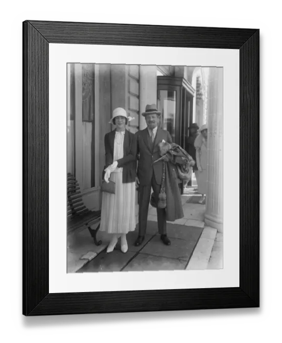 Framed Print : Popular stage star at Cannes Mrs Raymond Pollak with her husband at Cannes. She