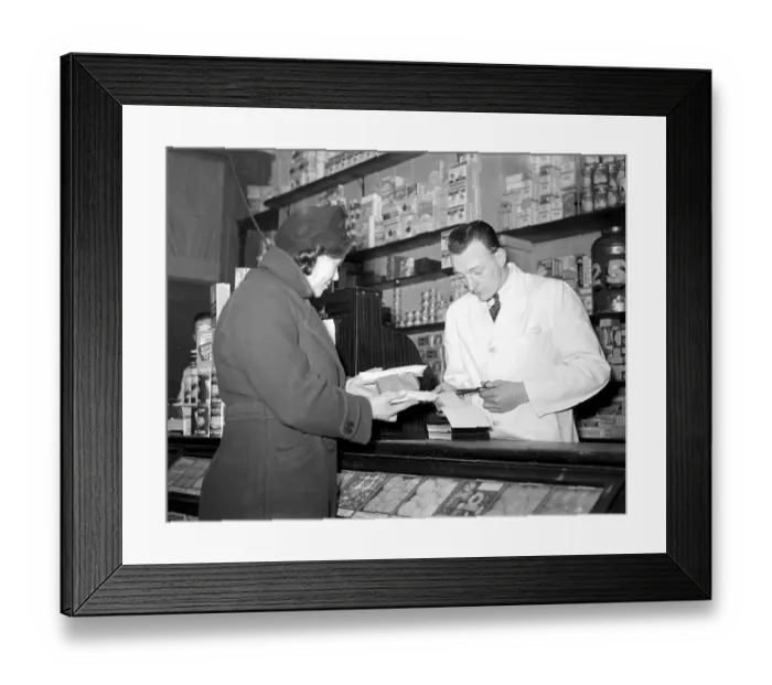 Framed Print : War 1939-1940. Rationing - cutting out the coupons for sugar at the grocer s. 8 Framed Print : War 1939-1940. Rationing - cutting out the coupons for sugar at the grocer s. 8