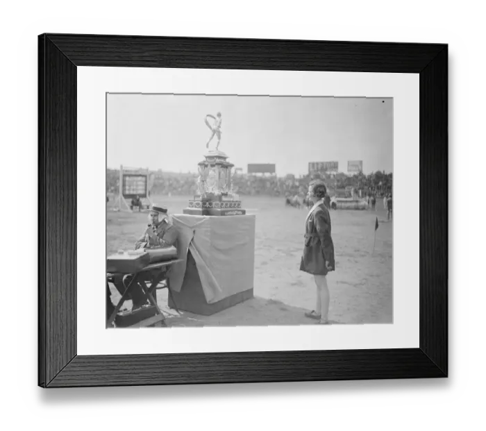 Framed Print : Polytechnic Sports at Stamford Bridge A competitor admiring the marathon trophy 16 Framed Print : Polytechnic Sports at Stamford Bridge A competitor admiring the marathon trophy 16