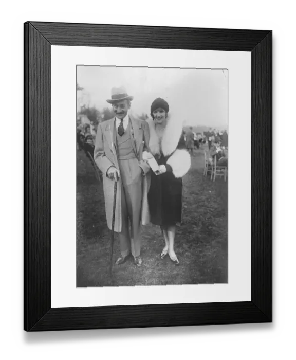 Framed Print : Film stars engagement. Adolphe Menjou the film star, with Miss Katherine Carver Framed Print : Film stars engagement. Adolphe Menjou the film star, with Miss Katherine Carver