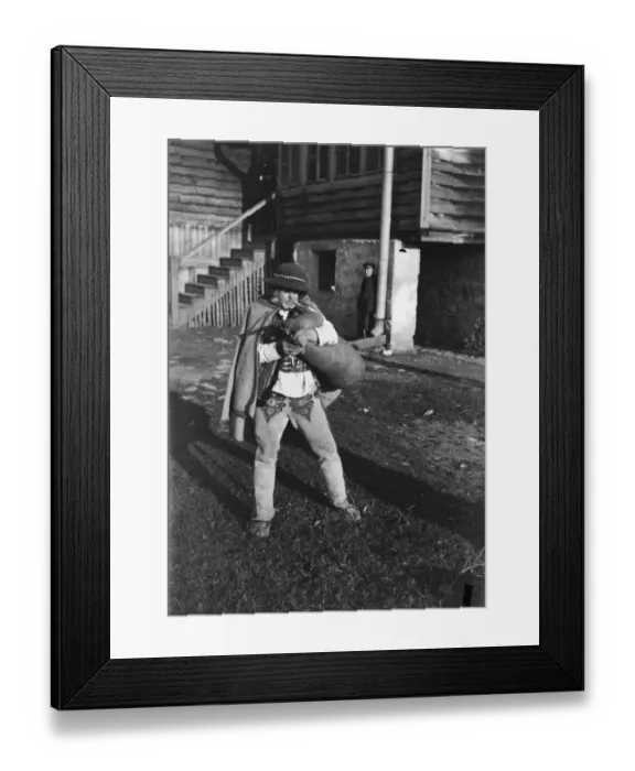 Framed Print : Polands farmyard piper. A Polish piper playing merrily in a farmyard while Framed Print : Polands farmyard piper. A Polish piper playing merrily in a farmyard while
