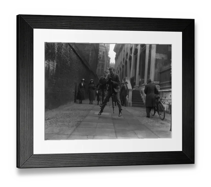 Framed Print : Pogo sticks at Cambridge An undergraduate who had to dismount involuntarily during the event Framed Print : Pogo sticks at Cambridge An undergraduate who had to dismount involuntarily during the event
