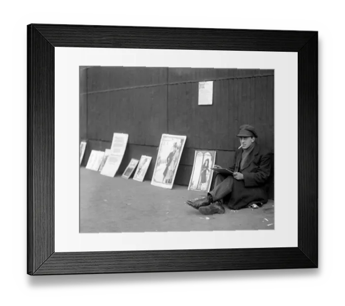 Framed Print : Pavement artist in oils. Ex Officer paints pictures in oil while seated on Framed Print : Pavement artist in oils. Ex Officer paints pictures in oil while seated on