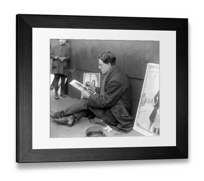 Framed Print : Pavement artist in oils. Ex Officer paints pictures in oil while seated on Framed Print : Pavement artist in oils. Ex Officer paints pictures in oil while seated on