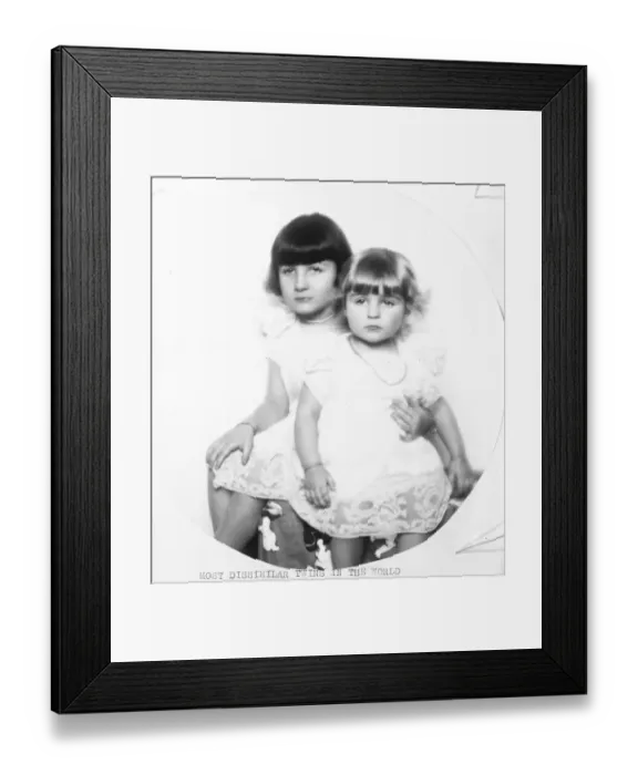 Framed Print : Most dissimilar twins in the world. Inez and Marie Deschamps, the small daughters Framed Print : Most dissimilar twins in the world. Inez and Marie Deschamps, the small daughters
