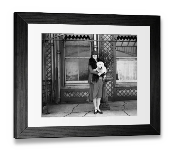 Framed Print : The actress, Miss Phyllis Titmuss pictured with her pet dog in Brighton, Sussex Framed Print : The actress, Miss Phyllis Titmuss pictured with her pet dog in Brighton, Sussex