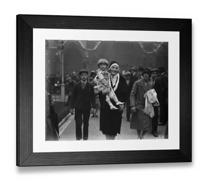 Framed Print : Frances Doble wedding. The little son of Commander Glen Kidston arriving with his mother