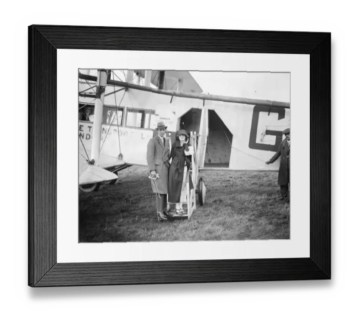 Framed Print : The honeymoon express. Pilot Officer Whinney, RAF, who married Miss Edna Moodie