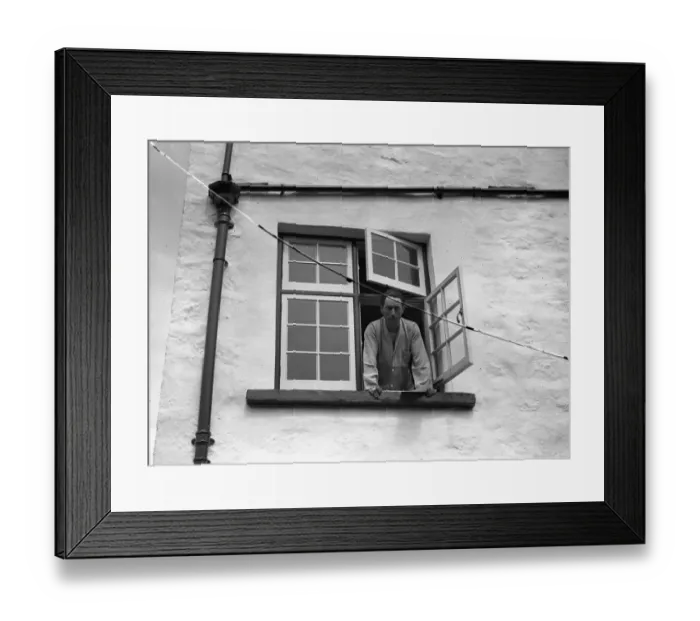 Framed Print : Mr Compton Mackenzie looking out of the window of his island home on Jethou, Channel Islands Framed Print : Mr Compton Mackenzie looking out of the window of his island home on Jethou, Channel Islands
