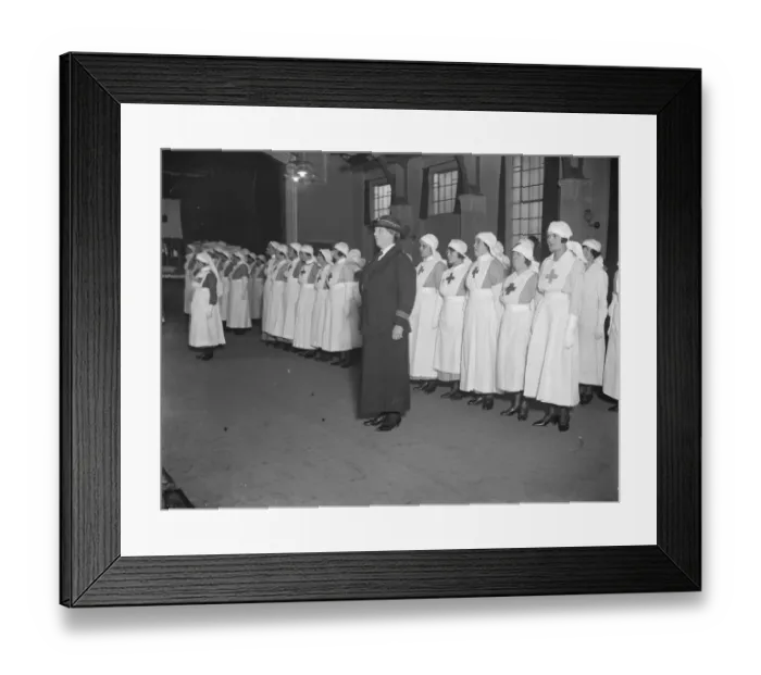 Framed Print : A well known actress as Red Cross section leader. At an official inspection of