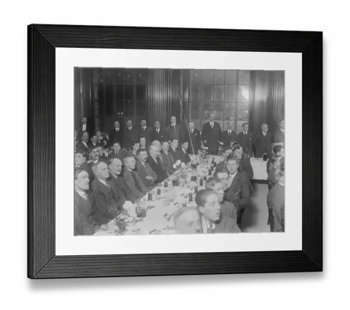 Framed Print : Workmen entertained to Christmas dinner in partially completed city building Framed Print : Workmen entertained to Christmas dinner in partially completed city building