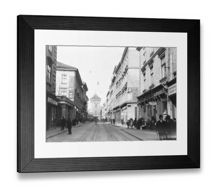 Framed Print : Cracow, Poland. A street scene in Cracow also one of the main gates in the City wall Framed Print : Cracow, Poland. A street scene in Cracow also one of the main gates in the City wall