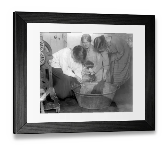 Framed Print : Home dyeing and weaving industry at Alston Studio. Rinsing the wool after a bath Framed Print : Home dyeing and weaving industry at Alston Studio. Rinsing the wool after a bath