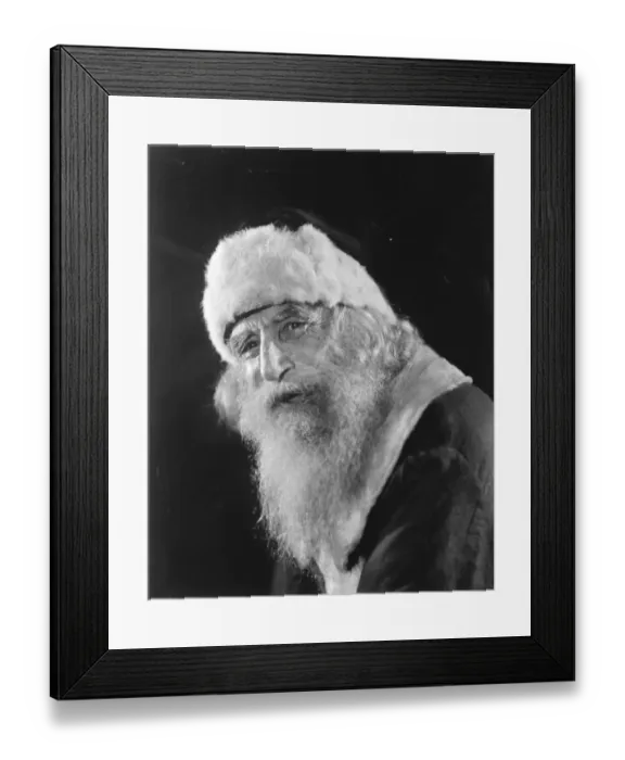 Framed Print : A smile for millions. A happy study of Father Christmas, whose smile, as usual Framed Print : A smile for millions. A happy study of Father Christmas, whose smile, as usual