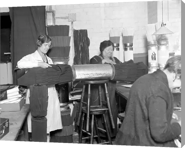The making of Christmas Crackers at Mead and Fields, Holborn. 1928