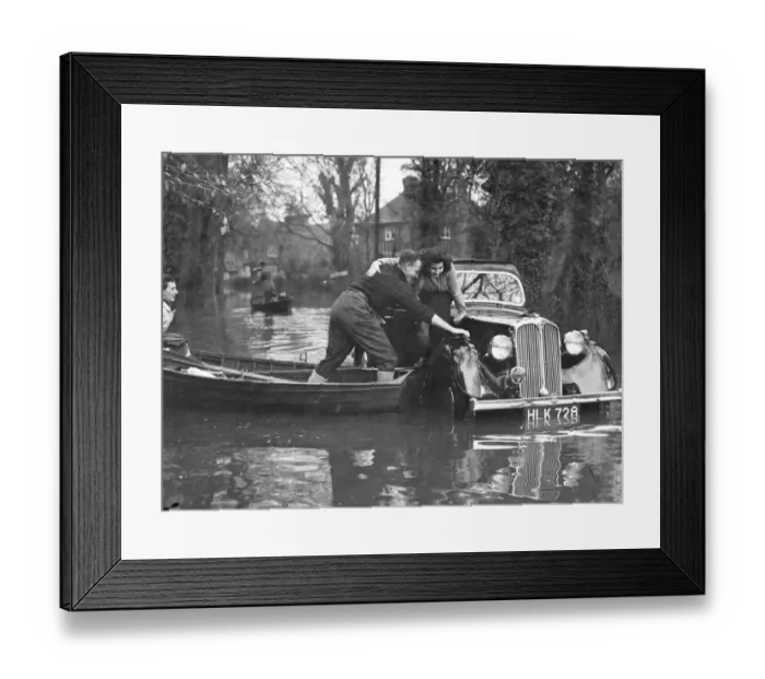 Framed Print : Rescue comes by boat to the occupants of a marooned car in a flooded road at Maidenhead Framed Print : Rescue comes by boat to the occupants of a marooned car in a flooded road at Maidenhead