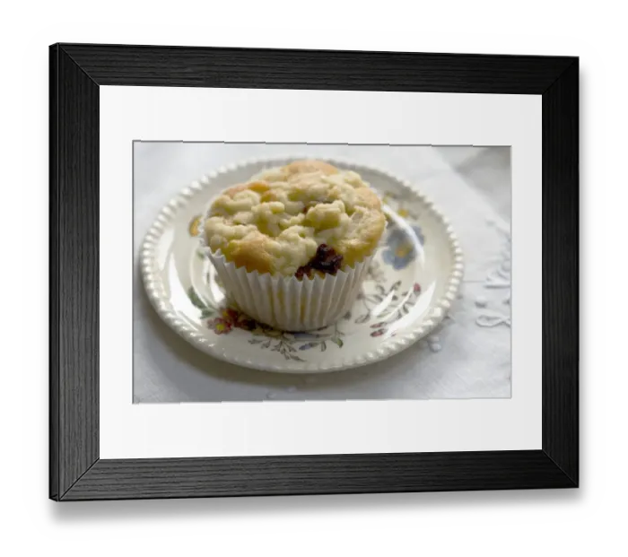 Framed Print : Muffin baked with topping of fresh grated apple on small patterned plate credit Framed Print : Muffin baked with topping of fresh grated apple on small patterned plate credit