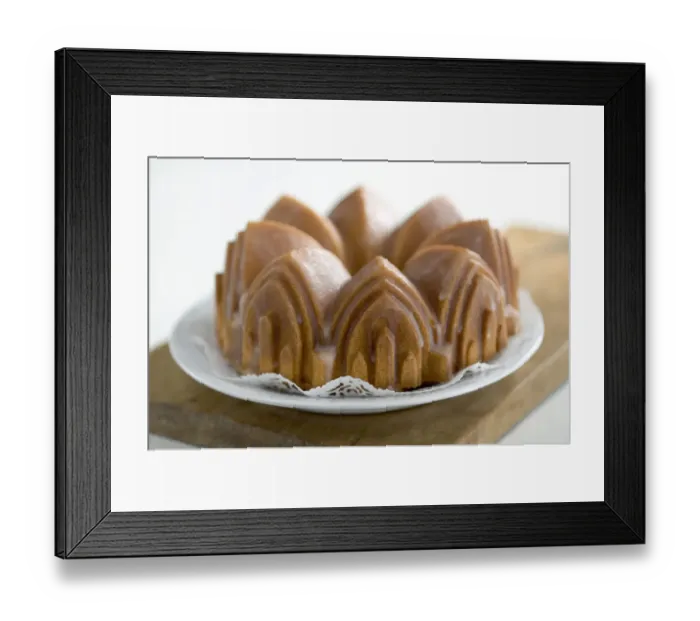 Framed Print : Classic pound cake baked in cathedral style Bundt tin, with sugar glaze credit