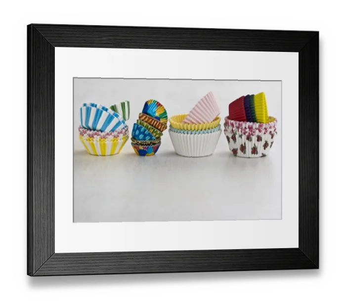 Framed Print : Stacks of decorative paper and foil cake and muffin cases credit: Marie-Louise Framed Print : Stacks of decorative paper and foil cake and muffin cases credit: Marie-Louise