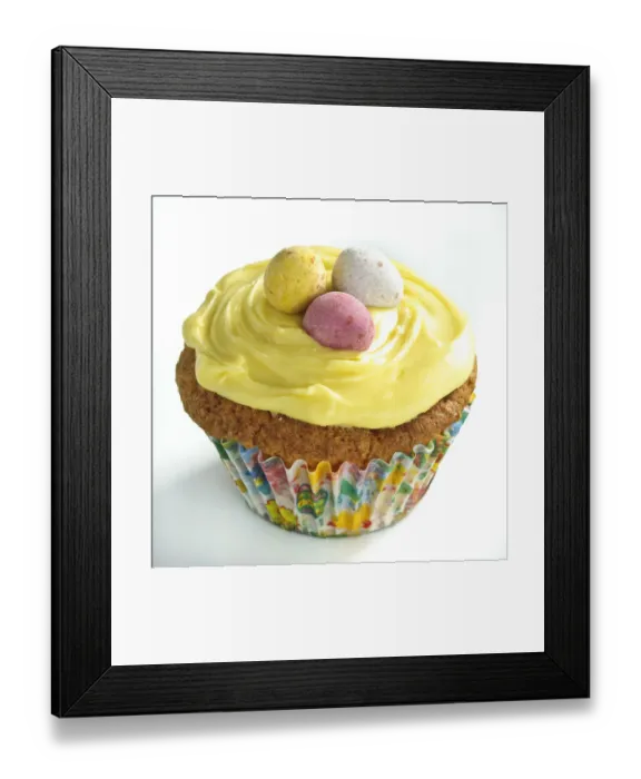 Framed Print : Iced Easter cupcake with chocolate mini eggs credit: Marie-Louise Avery / thePictureKitchen Framed Print : Iced Easter cupcake with chocolate mini eggs credit: Marie-Louise Avery / thePictureKitchen