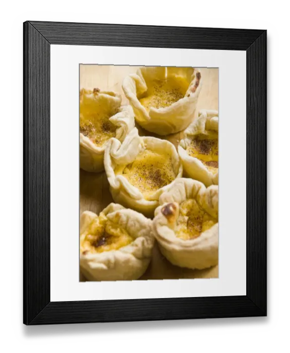 Framed Print : Home made portuguese style custard tarts with confectioners custard and puff pastry credit Framed Print : Home made portuguese style custard tarts with confectioners custard and puff pastry credit
